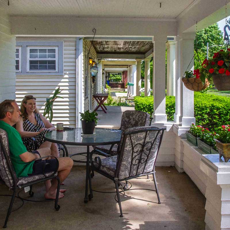 Couple relaxing on their front porch, Dayton OH